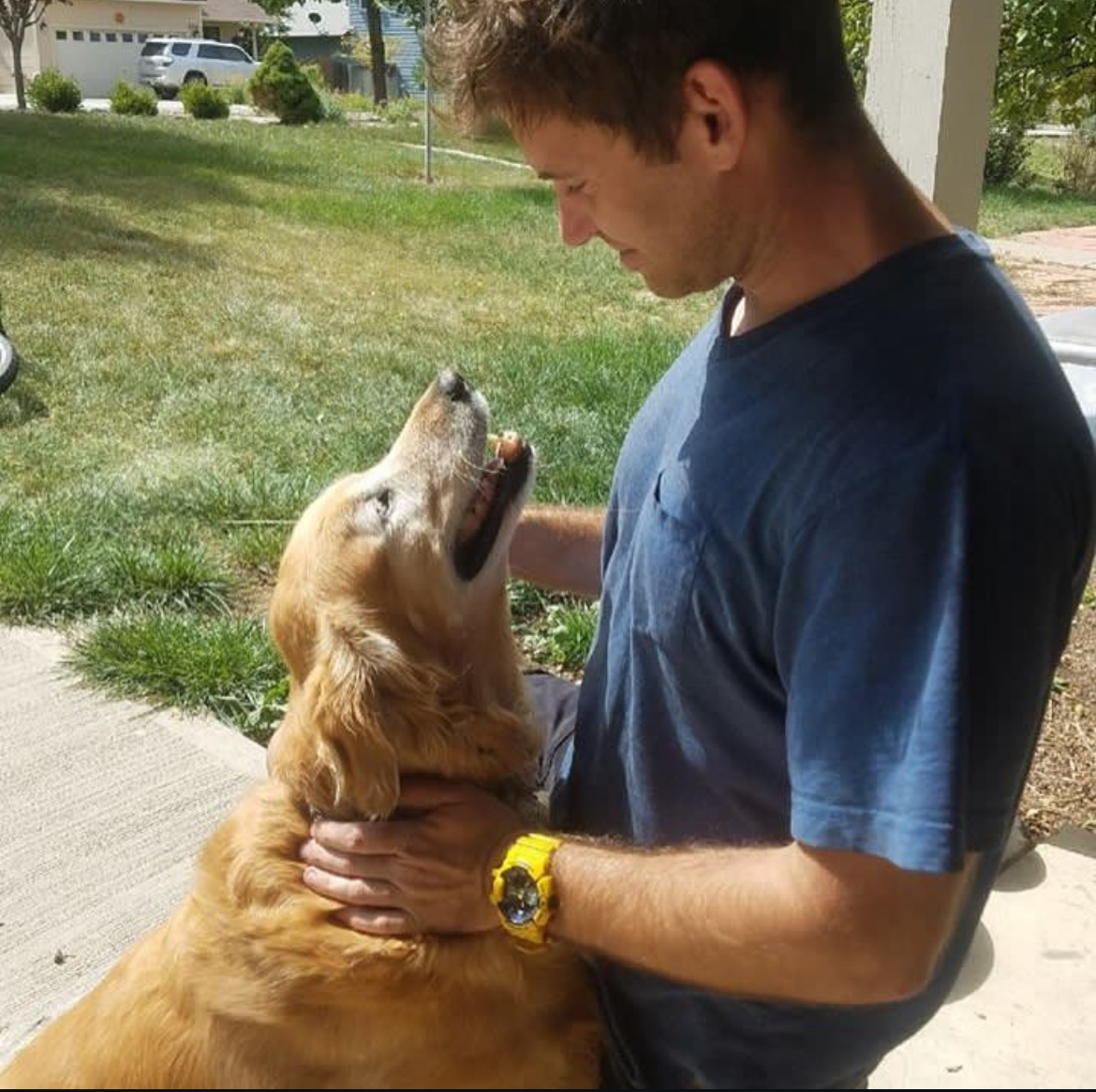 Cameron with a Golden Retriever
